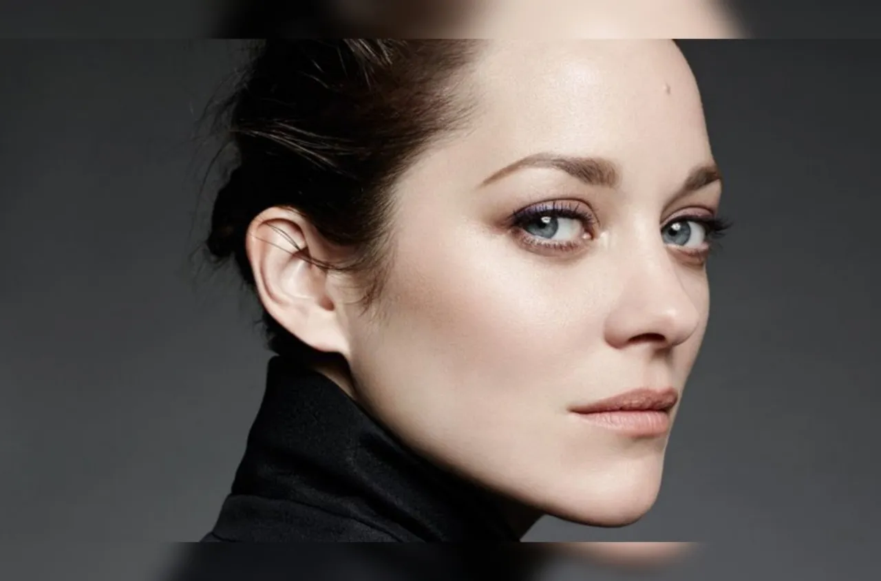 Марион Котияр на 50 години